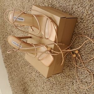 Rose gold heels matching clutch